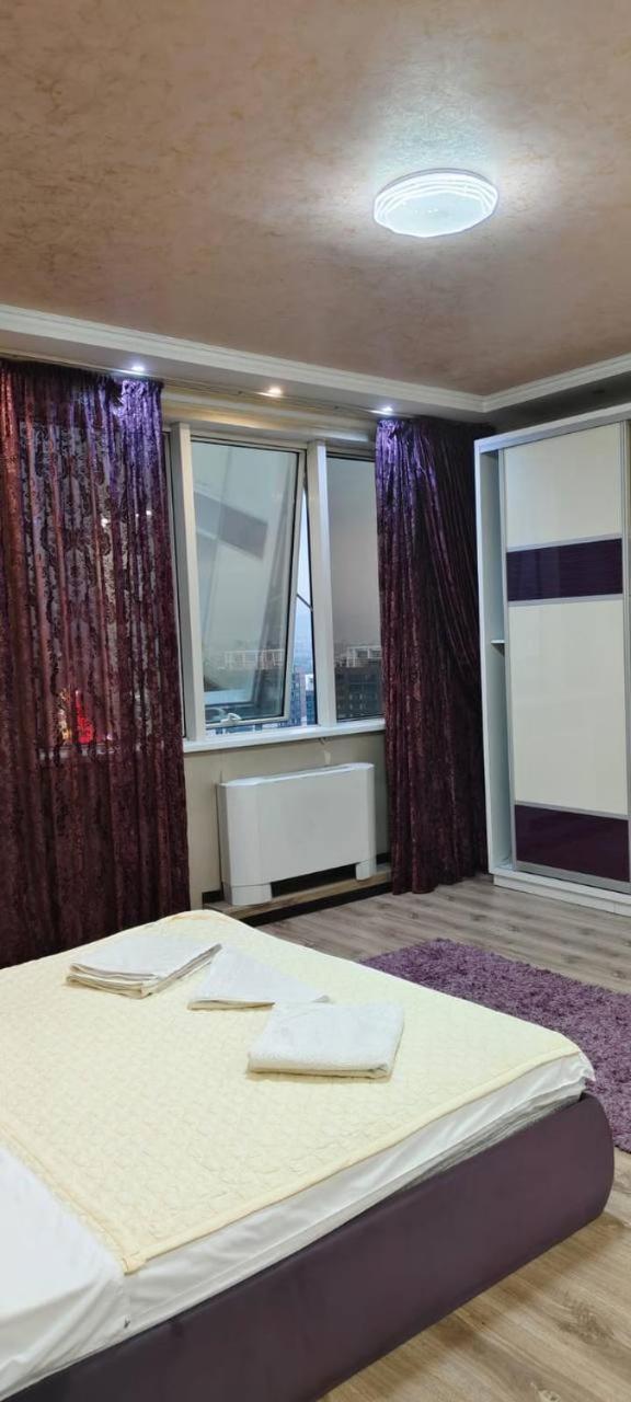 Nurly Tau 2Room Apartments Almaty Exterior photo